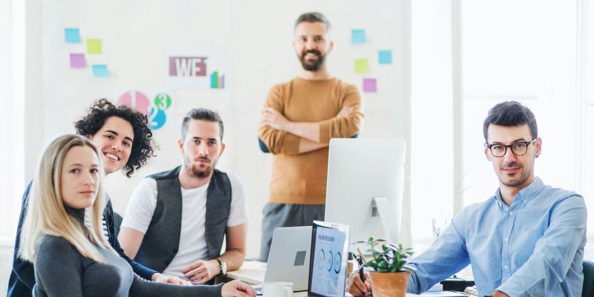 Team of professionals working together in an office.